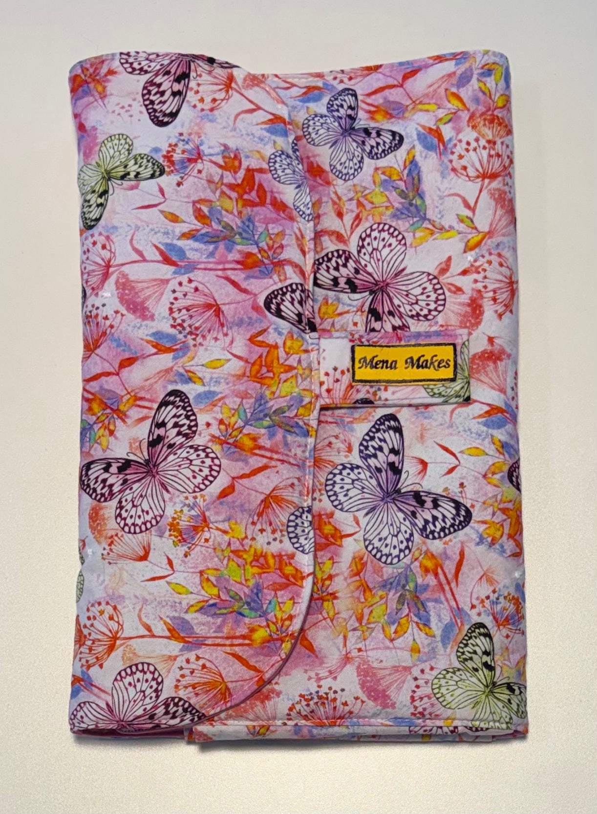 SINGLE HANDED CONVENIENCE.  Baby Changing Mat with pockets for Wipes &amp; Diapers  Fits what you need for on the go.